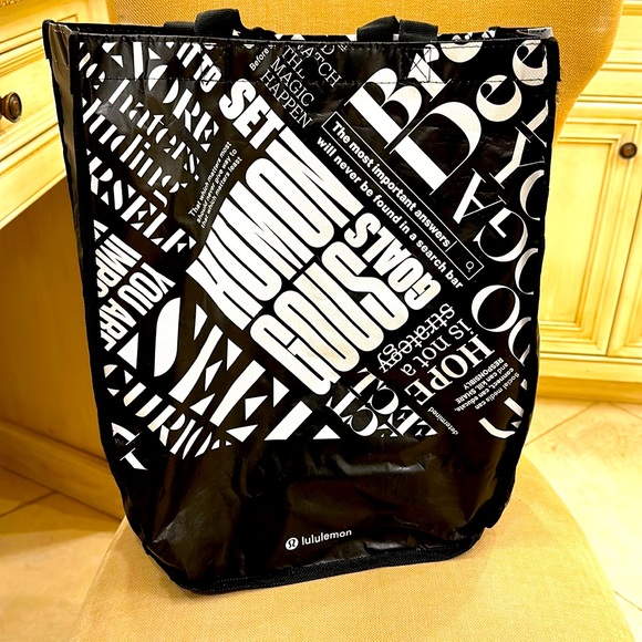 lululemon athletica Handbags - LULULEMON BLACK AND WHITE REUSABLE TOTE BAG WITH HANDLES AND SNAP ENCLOSURE